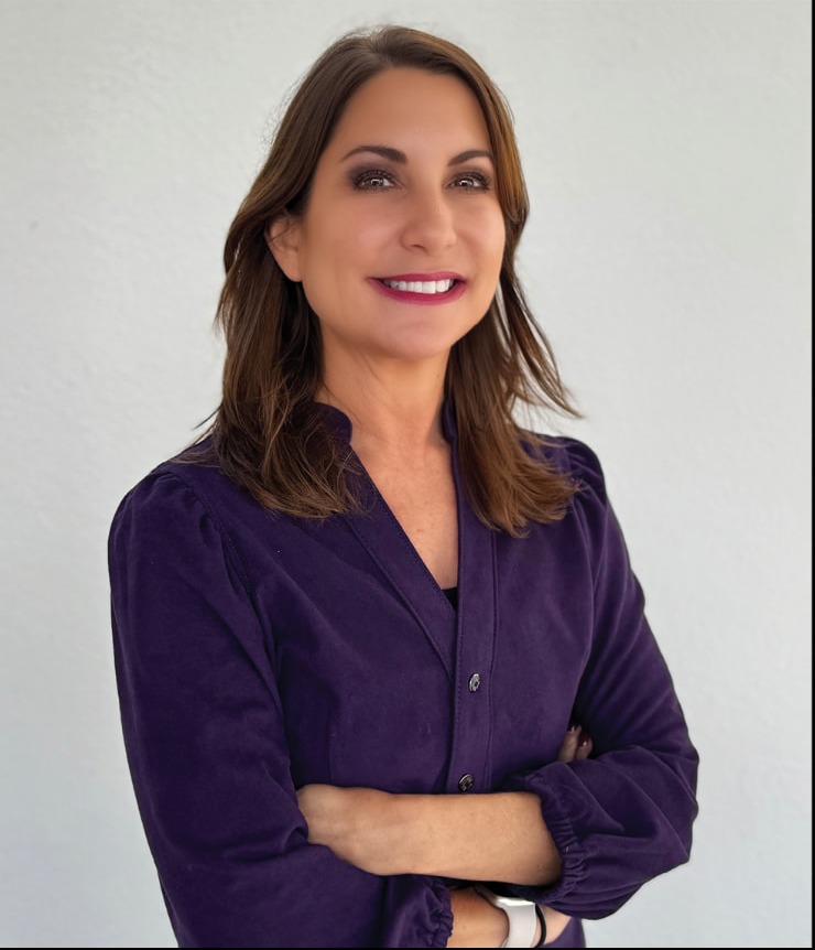 Professional headshot of Dara Kalvort, keynote speaker on AI and human choice
